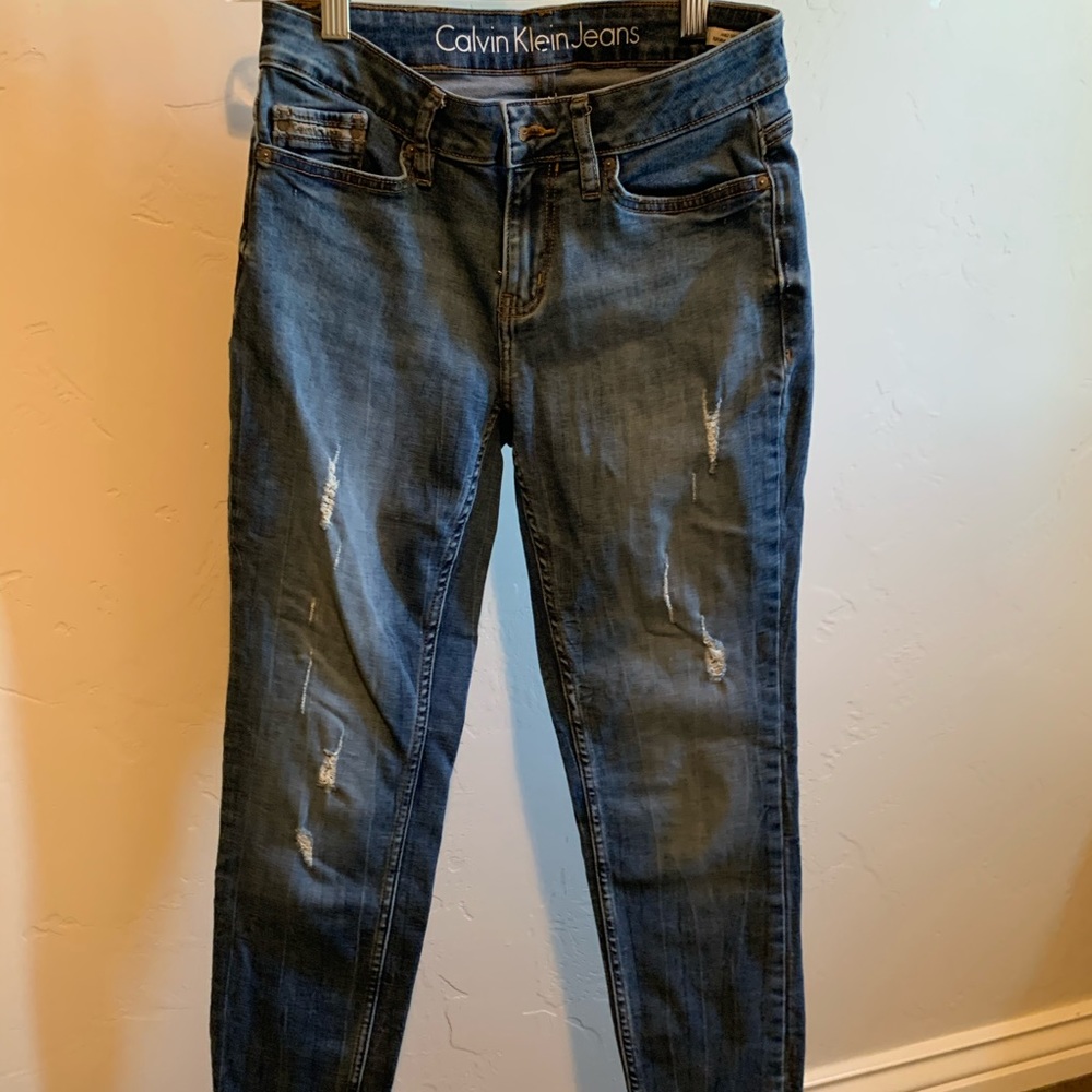 distressed Calvin Klein jeans!